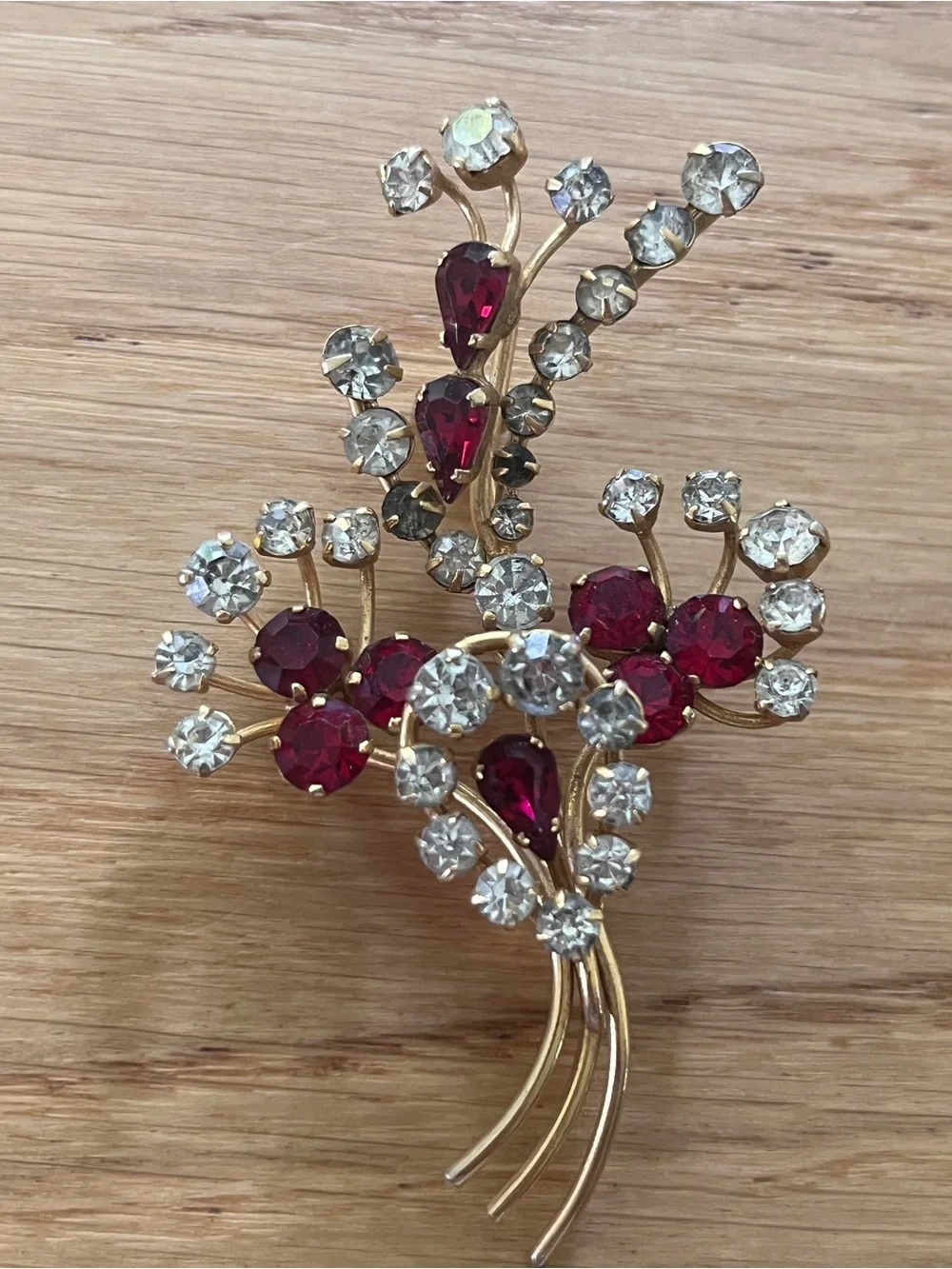 Vintage Gold-Tone Floral Brooch with Ruby Red and Clear Rhinestones
